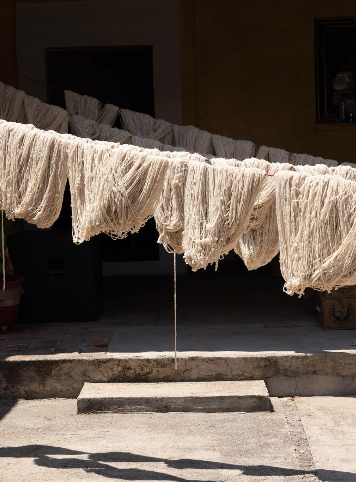 Natural yarn drying at an artisan weaving workshop