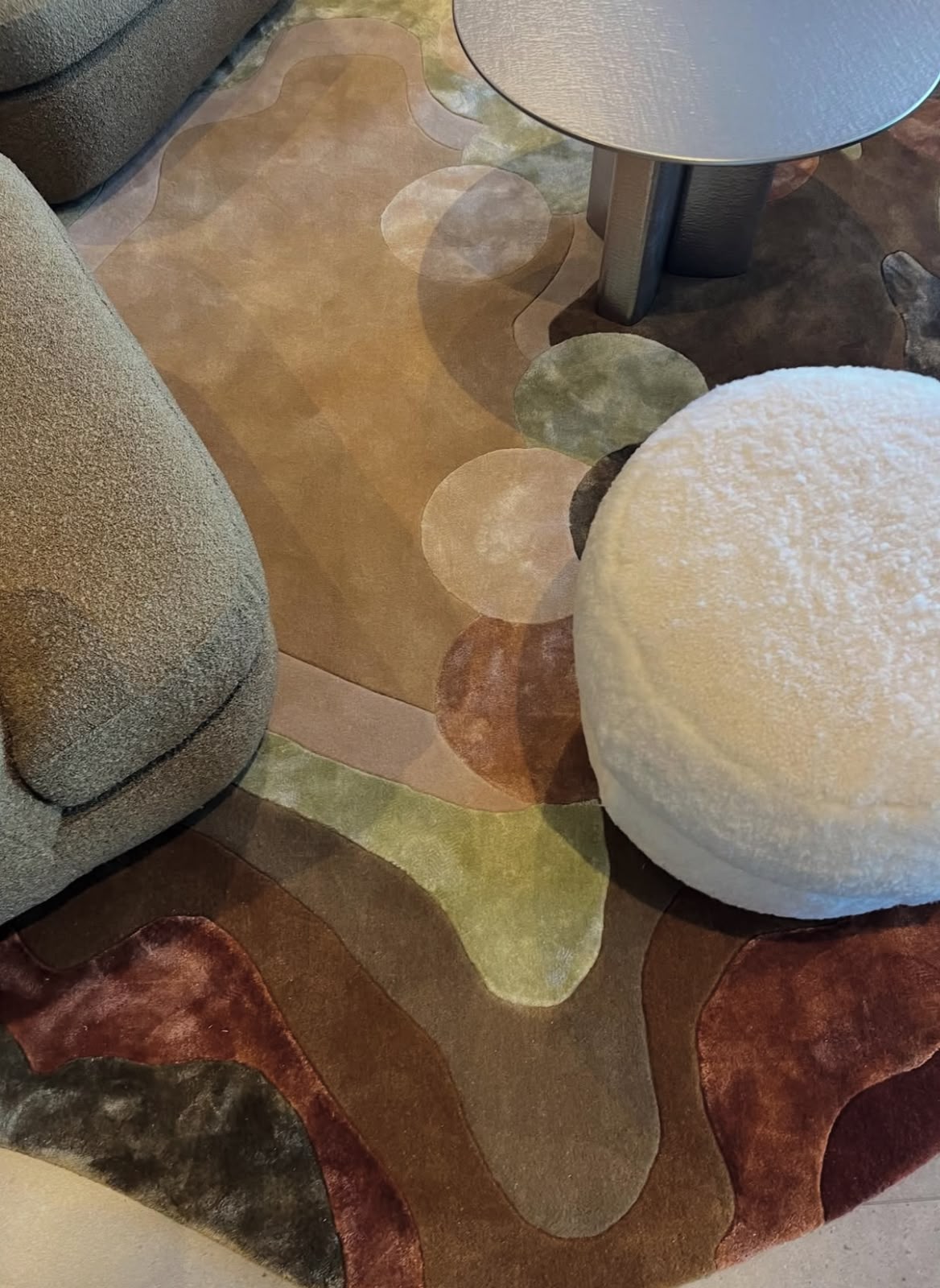 Close up of a sculpted earth tone abstract bespoke Zoya rug